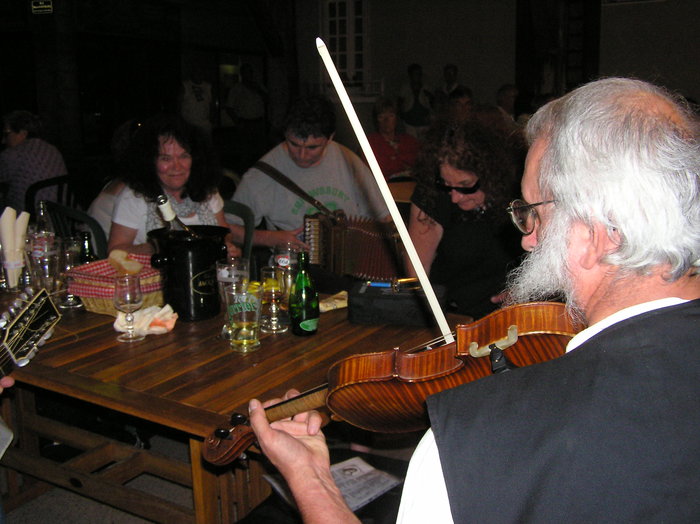 <p>Music session in the evening at the covered market place. Fiddler is Jean Blanchard - also playing melodeon on pic 14</p>