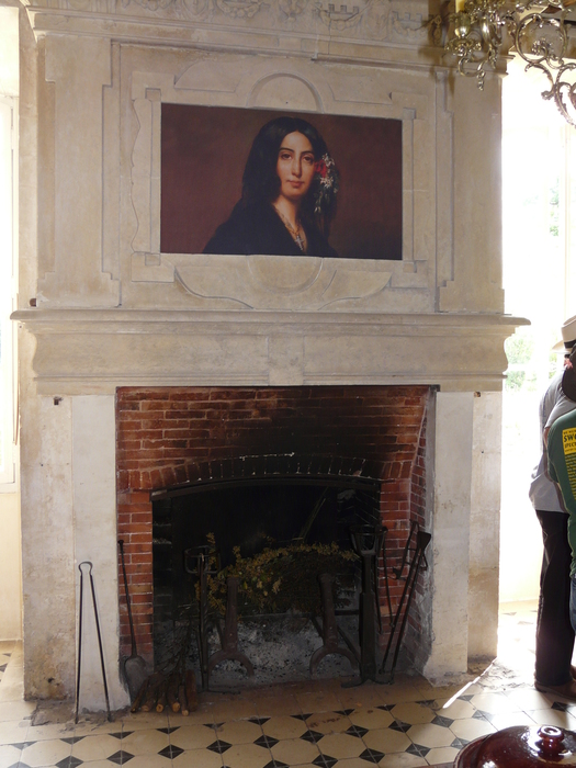 <p>Le Plaix: A portrait of George Sand, the 19th century novelist.  She
was an aristocratic lady (and paramour of Chopin) with a château at
nearby Nohant, who pretty well single-handedly was responsible for
documenting the life, traditions and music of the country people of
Berry.  She wrote a whole sequence of novels on the subject, and was
a bit like the French equivalent of Thomas Hardy.  Mic referred to
her as "our grandmother"!</p>