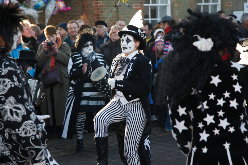 <p>Whittlesea Straw Bear 2012 in the Market Place.
Philippa in centre<br>
<i>Photo by David Muscroft</i></p>