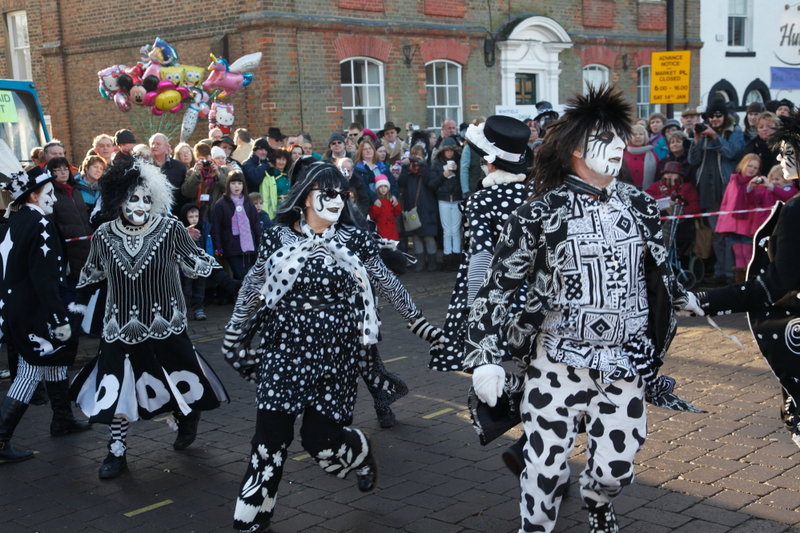 <p>Whittlesea Straw Bear 2012 in the Market Place
In Foreground: Sadie, Mandy, Kit
<br>
<i>Photo by David Muscroft</i></p>