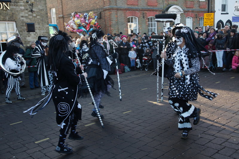 <p>Whittlesea Straw Bear 2012 in the Market Place<br>
Wardrobe Malfunction. That's the name of the dance, not a comment on their appearance...<br><i>Photo by David Muscroft</i></p>